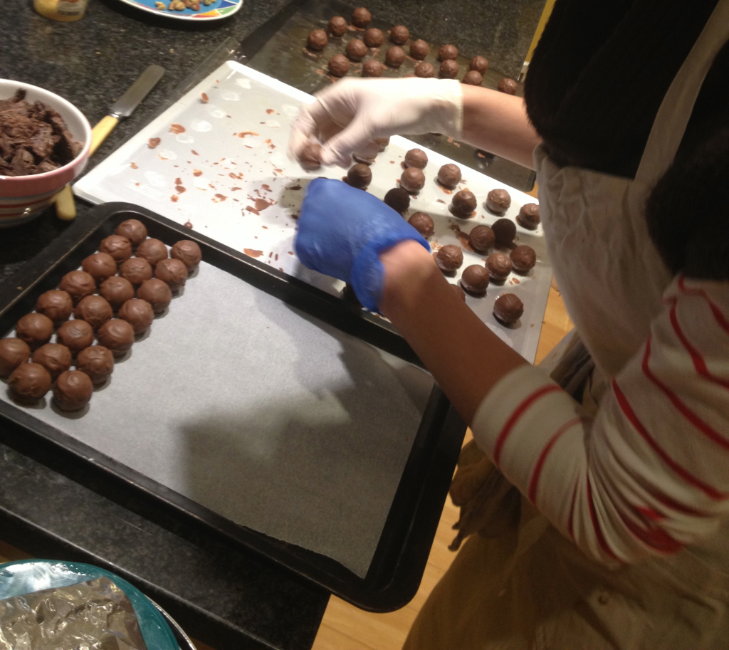 Frances tidying up and preparing chocolates for a final flourish.